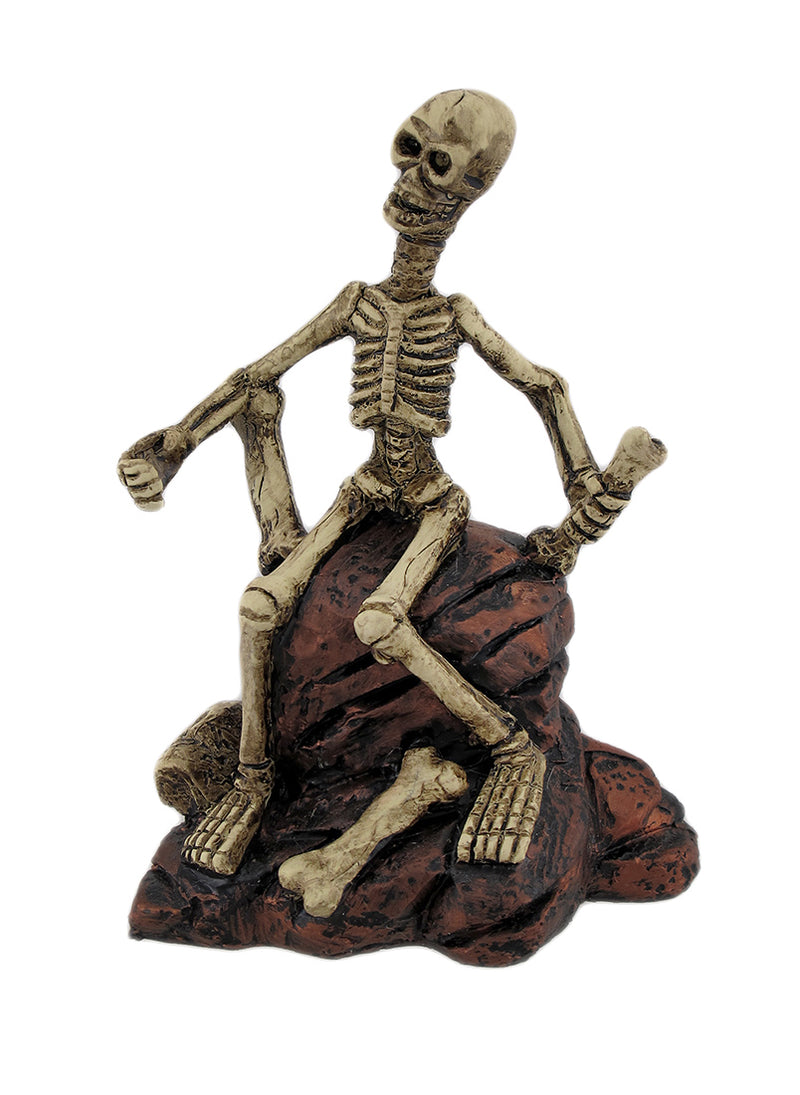 Creepy Skeleton Sitting On Rocks Statue Figure Image 1