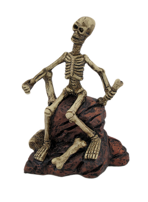 Creepy Skeleton Sitting On Rocks Statue Figure Image 1