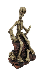 Creepy Skeleton Sitting On Rocks Statue Figure Image 2