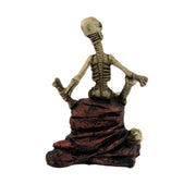 Creepy Skeleton Sitting On Rocks Statue Figure Image 3