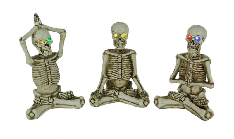 Bone Stretchers Yoga Skeleton Figurines with LED Eyes Set of 3 Image 1