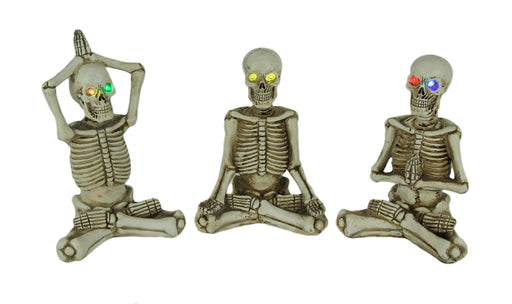 Bone Stretchers Yoga Skeleton Figurines with LED Eyes Set of 3 Image 1