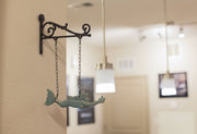 Rustic Brown and Sea Green Cast Iron Swimming Mermaid Hanging Wall Sculpture, 14.25 Inches High, Adorned with a Rustic Scroll