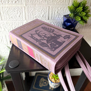 Things2die4 Book-Shaped Crossbody Bag, Alice in Wonderland Lavender Vinyl Handbag with Detachable Shoulder and Wrist Straps,
