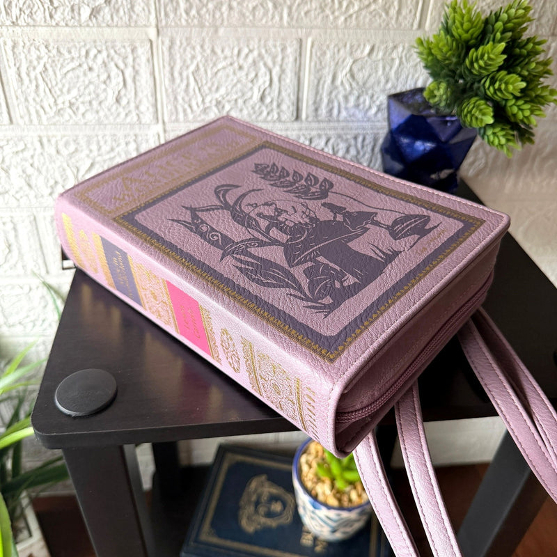 Things2die4 Book-Shaped Crossbody Bag, Alice in Wonderland Lavender Vinyl Handbag with Detachable Shoulder and Wrist Straps,