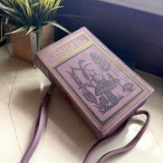 Things2die4 Book-Shaped Crossbody Bag, Alice in Wonderland Lavender Vinyl Handbag with Detachable Shoulder and Wrist Straps,