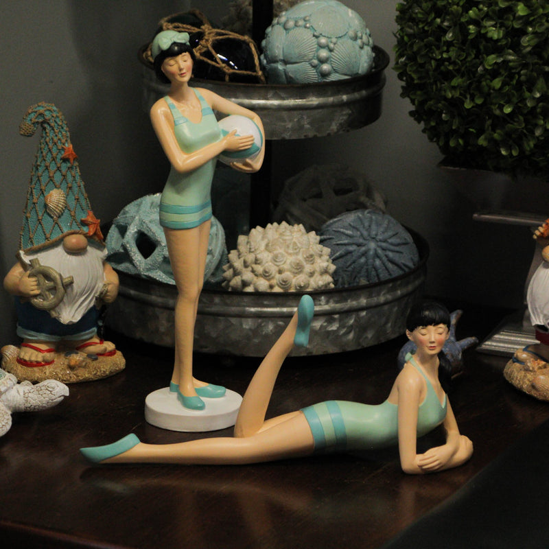 Graceful Brunette Retro Bathing Beauty Figurine – Sage Green & Light Blue Striped Swimsuit, Holding Beach Ball, Hand-Painted