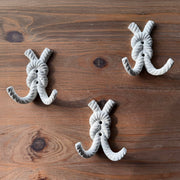 Zeckos 4 Inch Cast Iron Rope Knot Wall Hooks, Set of 3 Nautical Double Coat Hooks, Antique White Coastal Wall Decor with