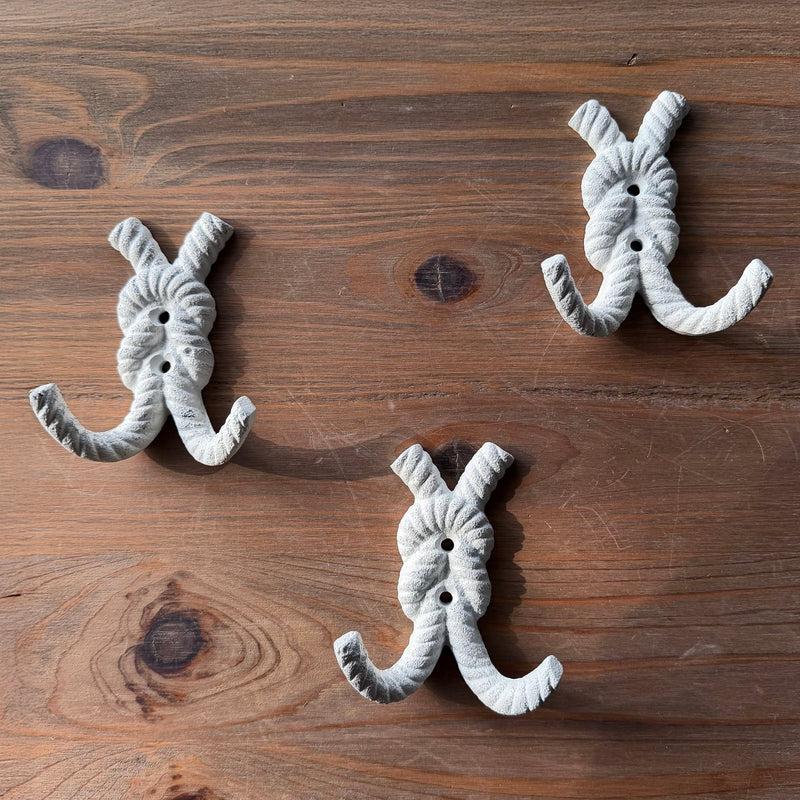 Zeckos 4 Inch Cast Iron Rope Knot Wall Hooks, Set of 3 Nautical Double Coat Hooks, Antique White Coastal Wall Decor with